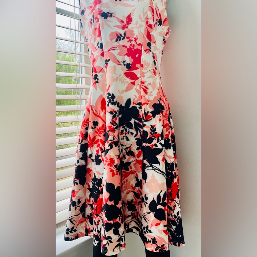 Spring dress. Size 6. Cut out shoulder design. Floral dress. A line flare dress